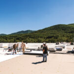 workers on a commercial roof