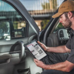 worker looking at a tablet