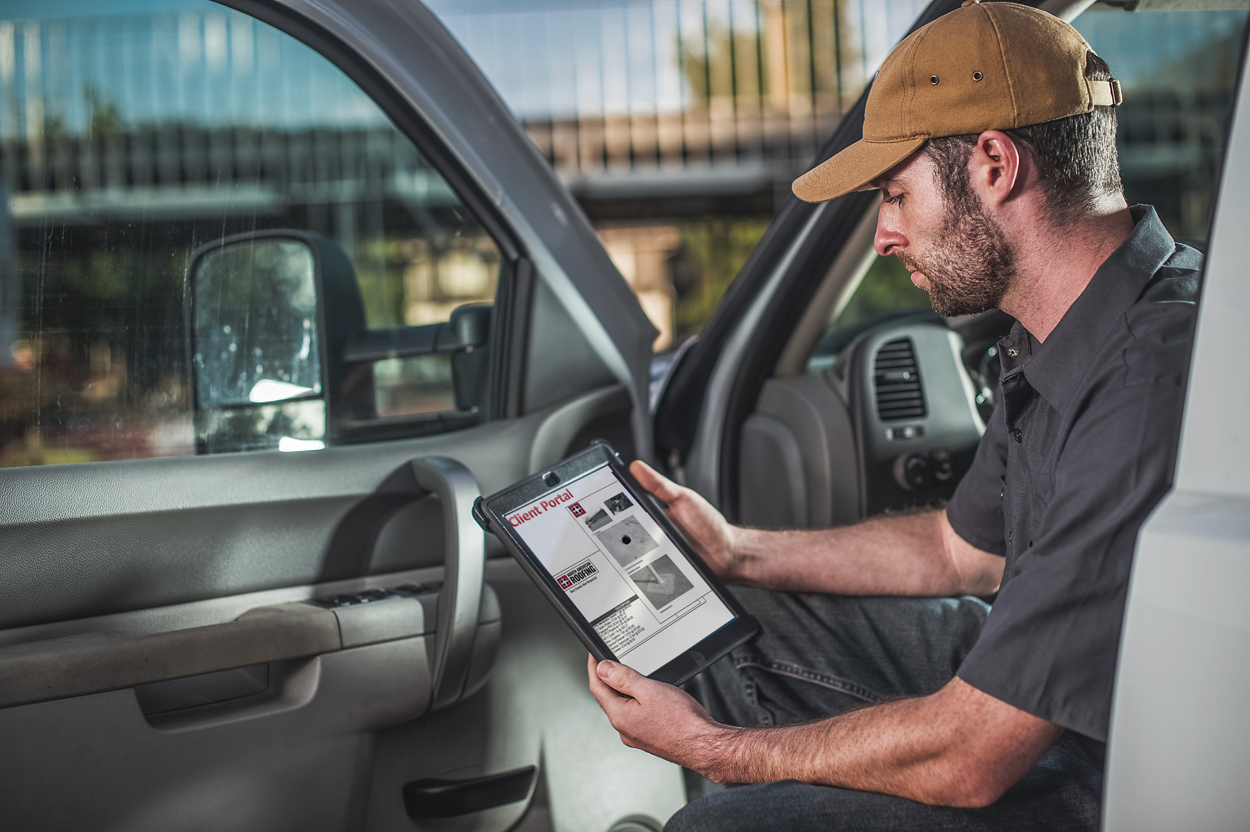 worker looking at a tablet
